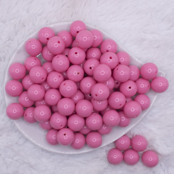 top view of a pile of 16mm Bubblegum Pink Solid Acrylic Bubblegum Jewelry Beads