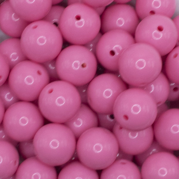 close up view of a pile of 16mm Bubblegum Pink Solid Acrylic Bubblegum Jewelry Beads