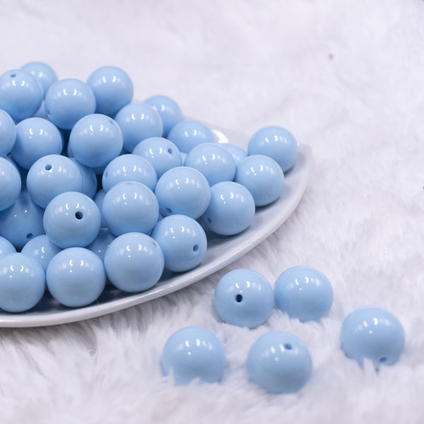 Front view of a pile of 16mm Carolina Blue Solid Acrylic Bubblegum Jewelry Beads