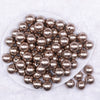 Top view of a pile of 16mm Champagne Gold Faux Pearl Acrylic Bubblegum Jewelry Beads
