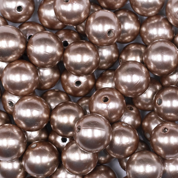 Close up view of a pile of 16mm Champagne Gold Faux Pearl Acrylic Bubblegum Jewelry Beads