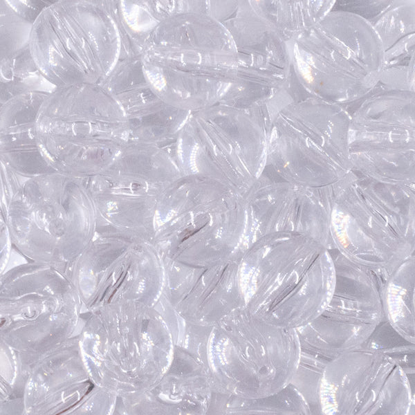 close up view of a pile of 16mm Clear Solid Acrylic Bubblegum Jewelry Beads