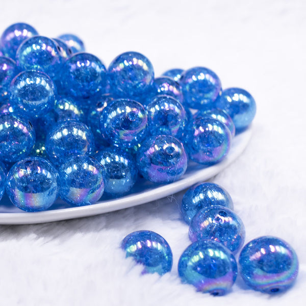 front view of a pile of 16mm Dark Blue Crackle AB Bubblegum Beads