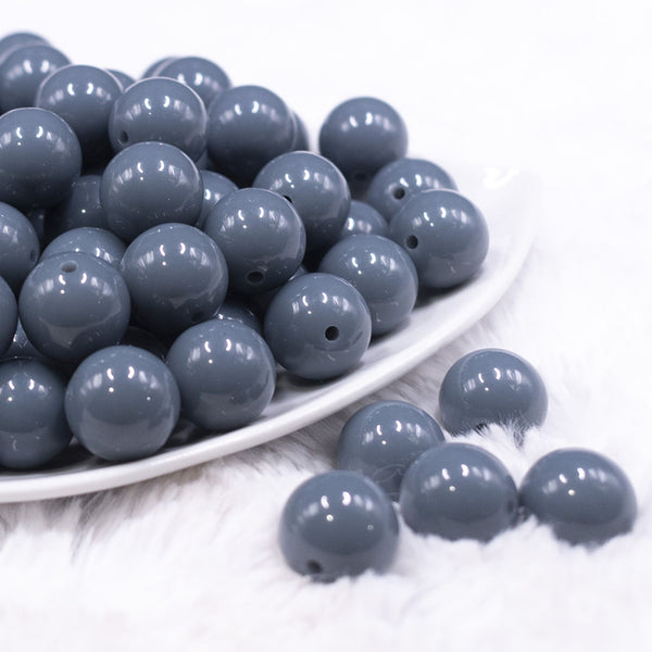 Front view of a pile of 16mm Dark Gray Solid Acrylic Bubblegum Jewelry Beads