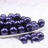 Front view of a pile of 16mm Dark Purple Faux Pearl Acrylic Bubblegum Jewelry Beads