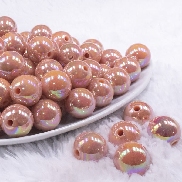front view of a pile of 16mm Dark Salmon Solid AB Bubblegum Beads