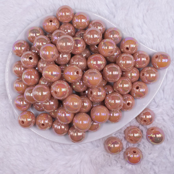 top view of a pile of 16mm Dark Salmon Solid AB Bubblegum Beads