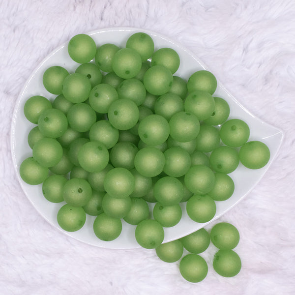 top view of a pile of 16mm Green Frosted Bubblegum Beads
