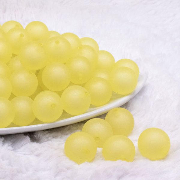 front view of a pile of 16mm Yellow Frosted Bubblegum Beads