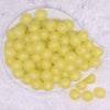top view of a pile of 16mm Yellow Frosted Bubblegum Beads