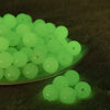 front view of a pile of 16mm glow in the dark bubblegum beads