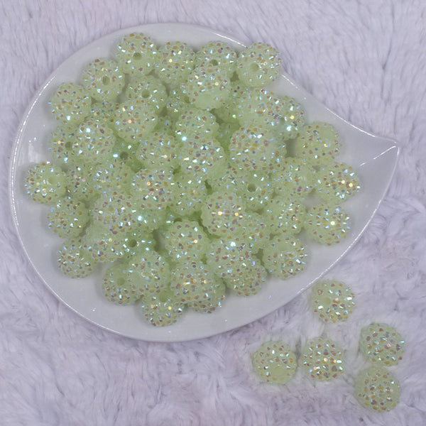 top view of a pile of 16mm Glow in the Dark Rhinestone AB Bubblegum Beads