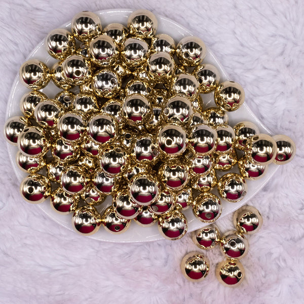 top view of a pile of 16mm Reflective Gold Acrylic Bubblegum Beads