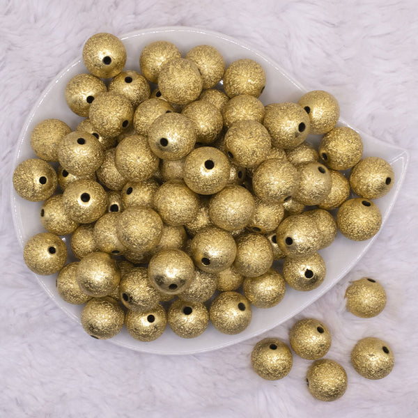 top view of a pile of 16mm Gold Stardust Acrylic Bubblegum Beads