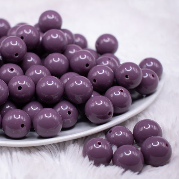 front view of a pile of 16mm Grape Purple Solid Bubblegum Beads