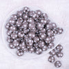 top view of a pile of 16mm Gray with White Polka Dots Bubblegum Beads
