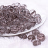 front view of a pile of 16mm Gray Transparent Disco Shaped Bubblegum Beads
