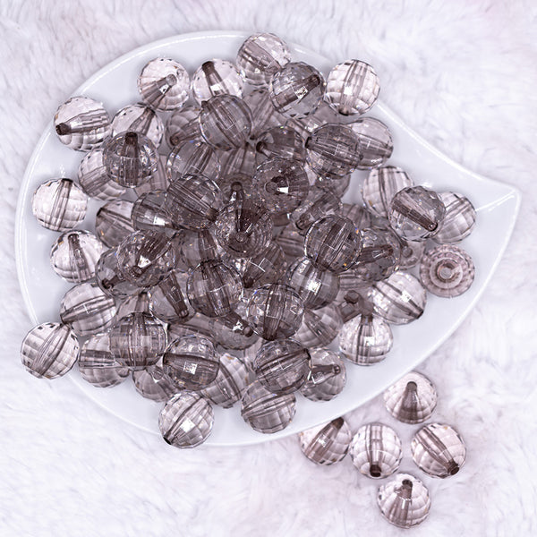 top view of a pile of 16mm Gray Transparent Disco Shaped Bubblegum Beads