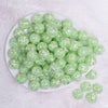 top view of a pile of 16mm Lime Green Majestic Confetti Bubblegum Beads