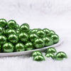 Front view of a pile of 16mm Green Faux Pearl Acrylic Bubblegum Jewelry Beads