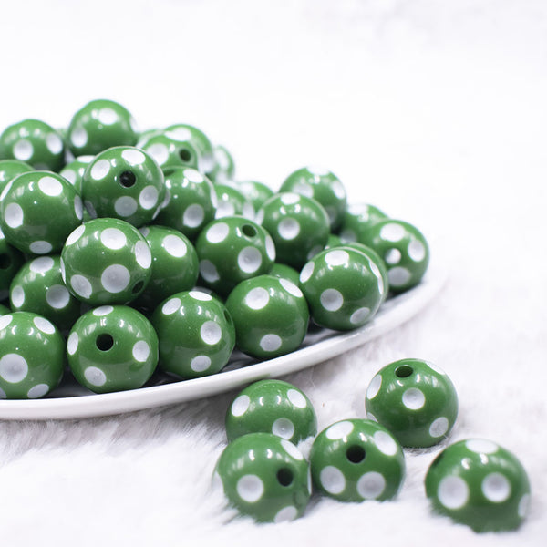 front view of a pile of 16mm Green with White Polka Dots Bubblegum Beads