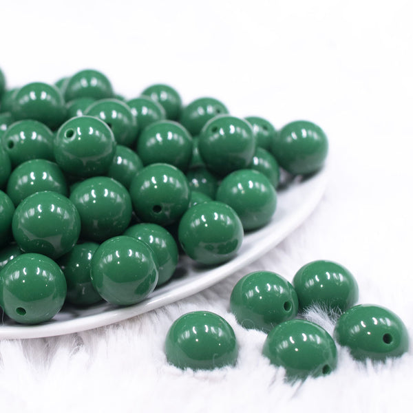 Front view of a pile of 16mm Green Solid Acrylic Bubblegum Jewelry Beads
