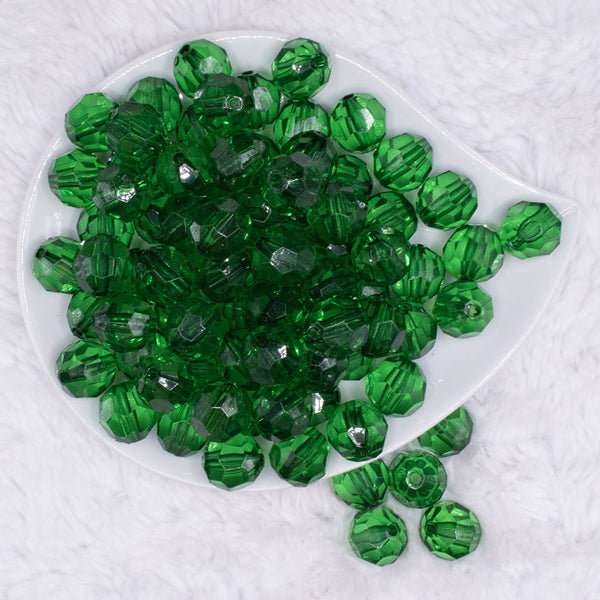top view of a pile of 16mm Green Transparent Faceted Bubblegum Beads
