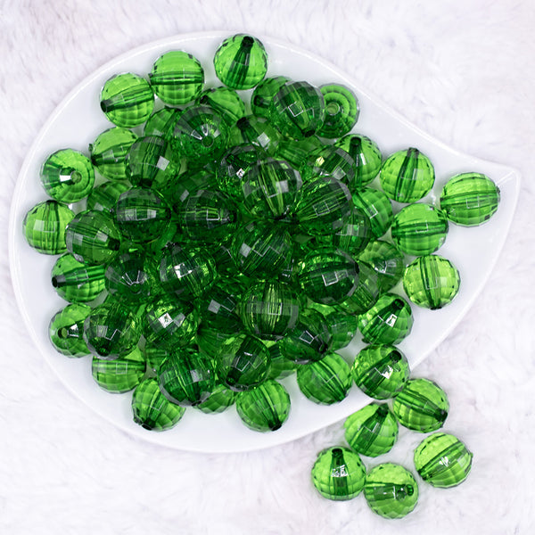 top view of a pile of 16mm Green Transparent Disco Shaped Bubblegum Beads