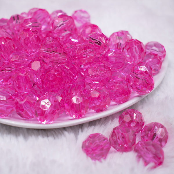 front view of a pile of 16mm Hot Pink Transparent Faceted Bubblegum Beads