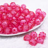 front view of a pile of 16mm Hot Pink Transparent Pumpkin Shaped Bubblegum Beads