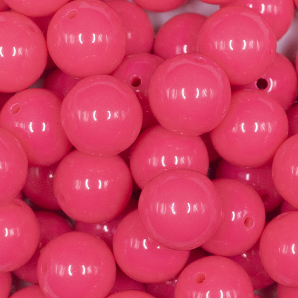 Close up view of a pile of 16mm Hubba Bubba Pink Solid Acrylic Bubblegum Jewelry Beads