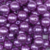 Close up view of a pile of 16mm Iris Purple Faux Pearl Acrylic Bubblegum Jewelry Beads