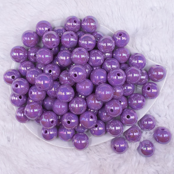 top view of a pile of 16mm Iris Purple Solid AB Bubblegum Beads
