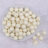 Top view of a pile of 16mm Off White Solid Acrylic Bubblegum Jewelry Beads