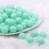 Front view of a pile of 16mm Light Neon Blue Solid Acrylic Bubblegum Jewelry Beads