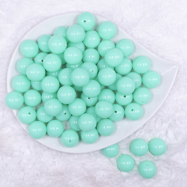 Top view of a pile of 16mm Light Neon Blue Solid Acrylic Bubblegum Jewelry Beads