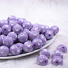 Front view of a pile of 16mm Light Purple with White Polka Dots Bubblegum Beads