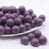 front view of a pile of 16mm Lilac Purple Solid Acrylic Bubblegum Jewelry Beads