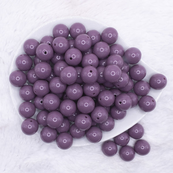 top view of a pile of 16mm Lilac Purple Solid Acrylic Bubblegum Jewelry Beads