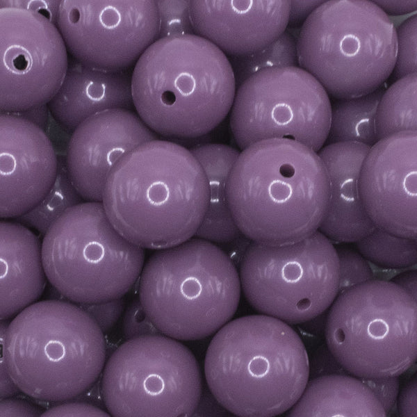 close up view of a pile of 16mm Lilac Purple Solid Acrylic Bubblegum Jewelry Beads