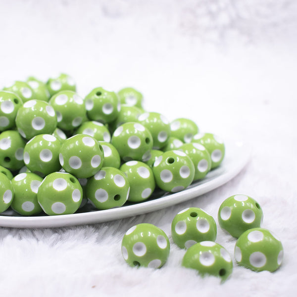 Front view of a pile of 16mm Lime Green with White Polka Dots Acrylic Bubblegum Beads