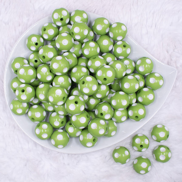 Top view of a pile of 16mm Lime Green with White Polka Dots Acrylic Bubblegum Beads