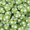 Close up view of a pile of 16mm Lime Green with White Polka Dots Acrylic Bubblegum Beads