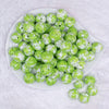 top view of a pile of 16mm Green Tablet Acrylic Bubblegum Beads