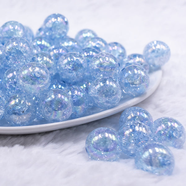 front view of a pile of 16mm Blue Crackle AB Bubblegum Beads
