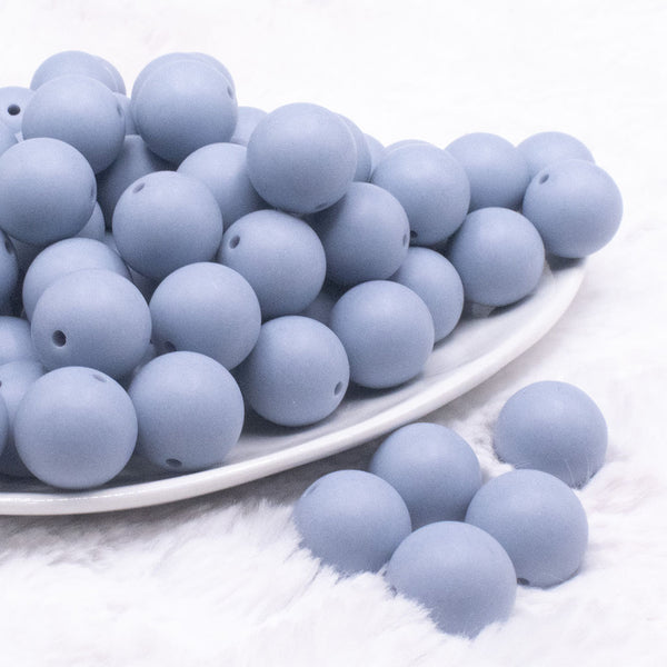 front view of a pile of 16mm Blue Gray Matte Solid Chunky Bubblegum Beads