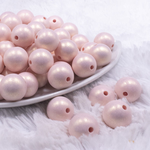 front view of a pile of 16mm Pink Matte Pearl Acrylic Bubblegum Jewelry Beads