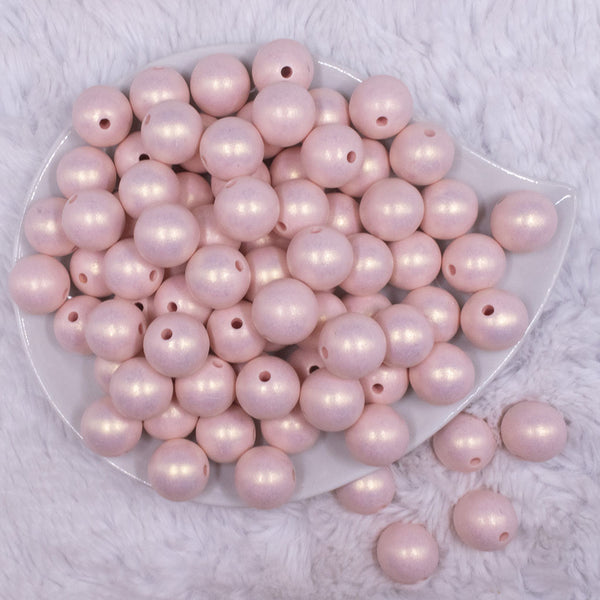 top view of a pile of 16mm Pink Matte Pearl Acrylic Bubblegum Jewelry Beads