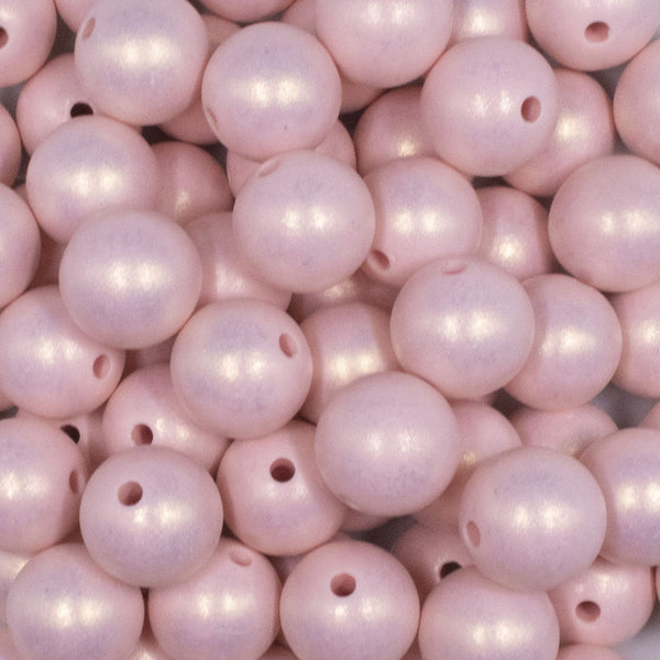 close up view of a pile of 16mm Pink Matte Pearl Acrylic Bubblegum Jewelry Beads
