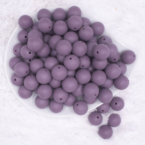 top view of a pile of 16mm Purple Matte Solid Chunky Bubblegum Beads